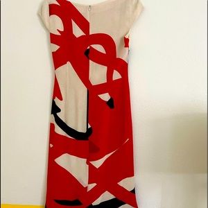 This is a size 8 silk Max Mara dress. It’s very curb hugging and flattering.